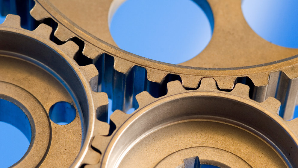 Cogs meshed together