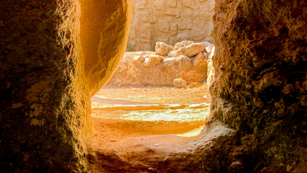 Tomb entrance with stone rolled away.